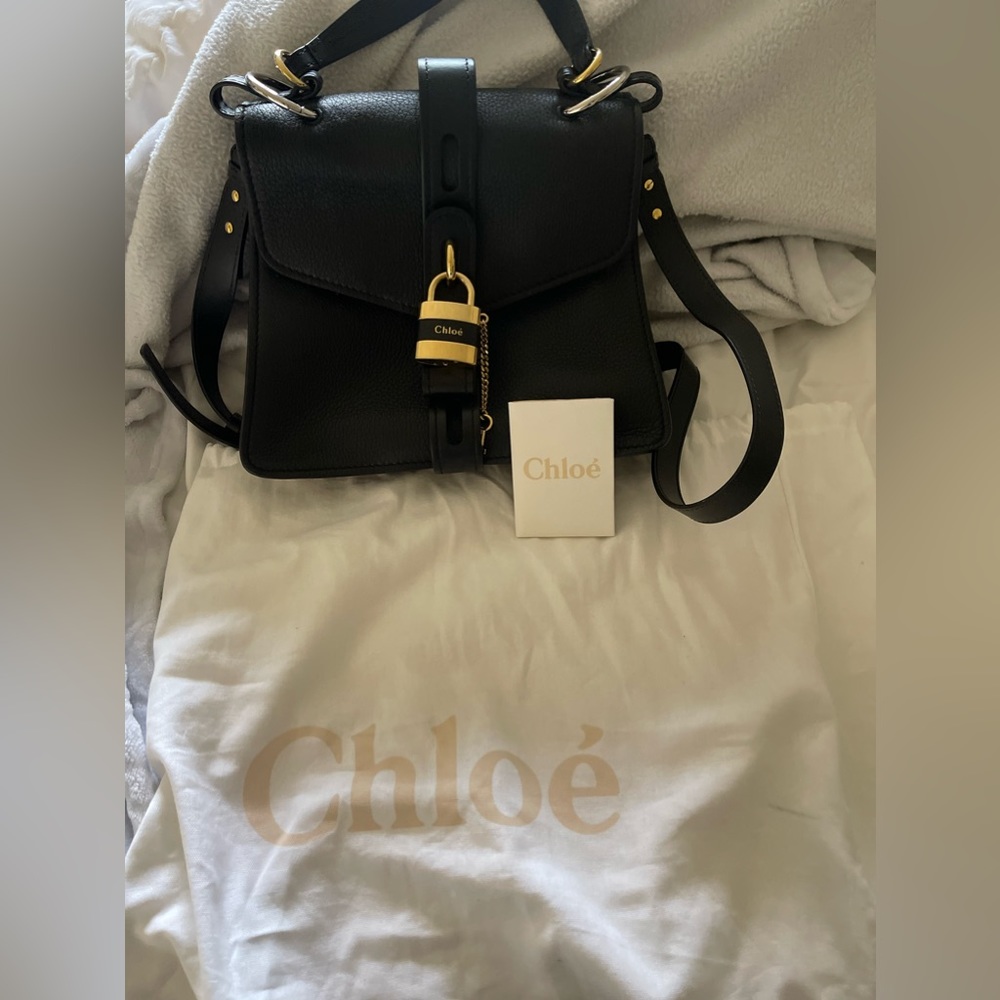 Brand new wore once, in perfect condition! Black leather, beautiful.